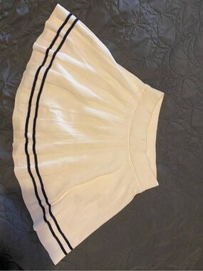 white pleated tennis skirt with navy stripes
